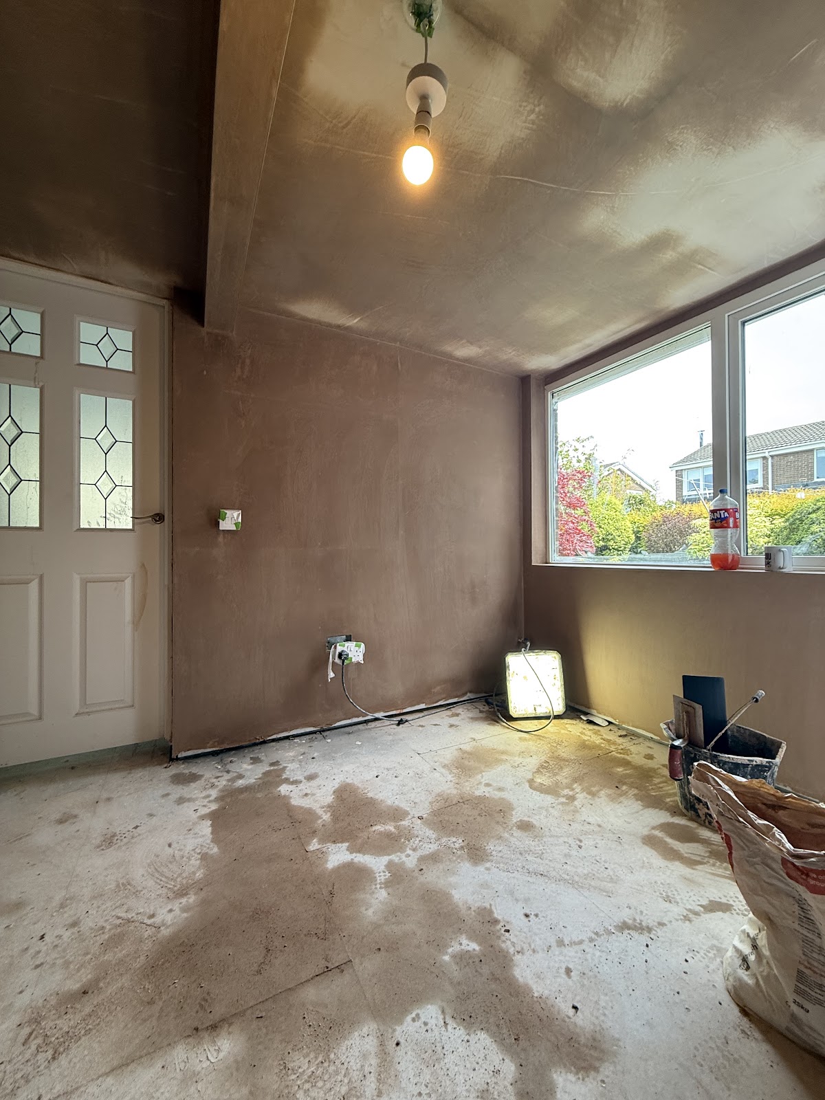 Room skimmed out, walls and ceiling in fresh plaster