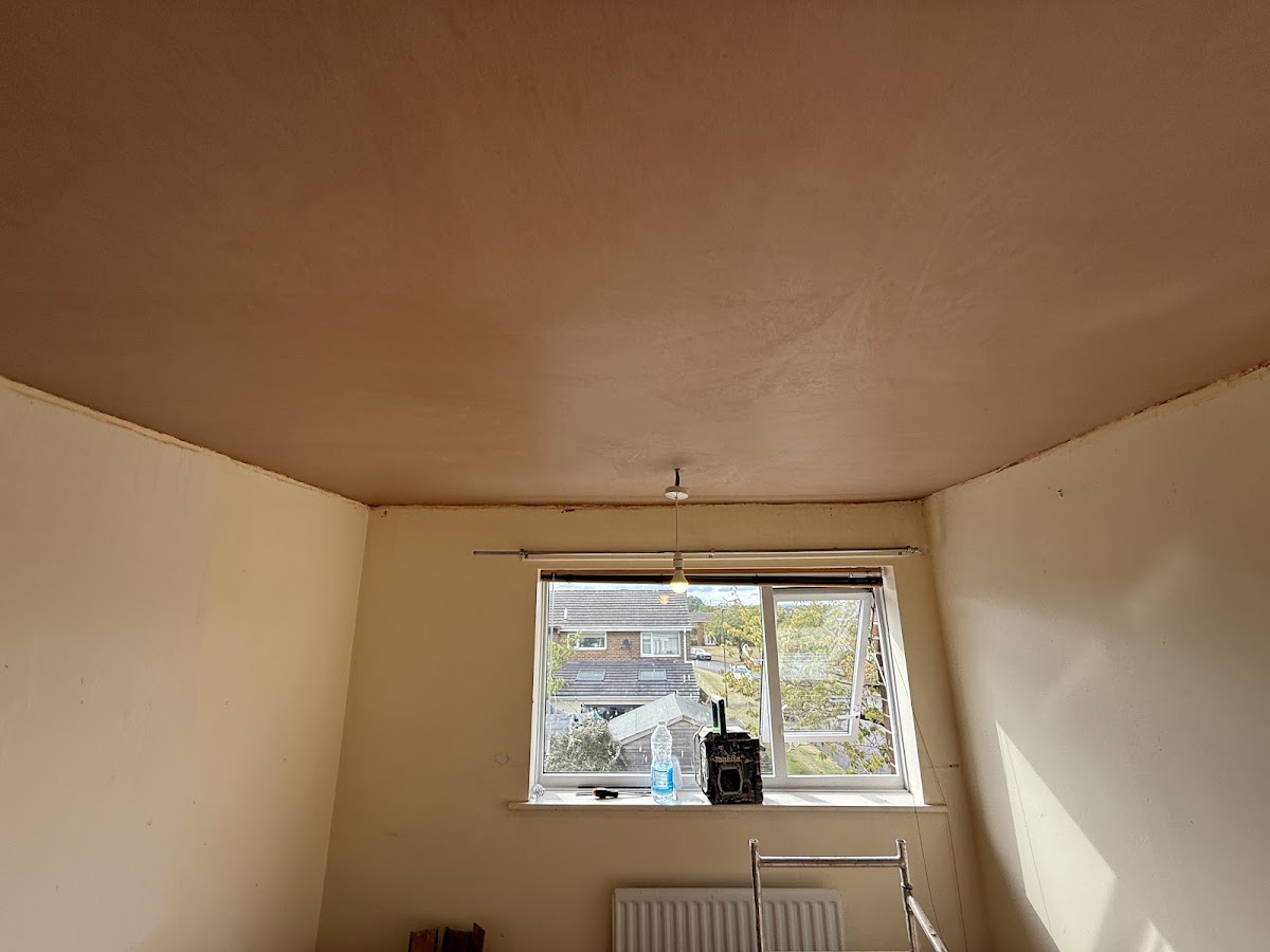 Ceiling skimmed flat and left ready for paint