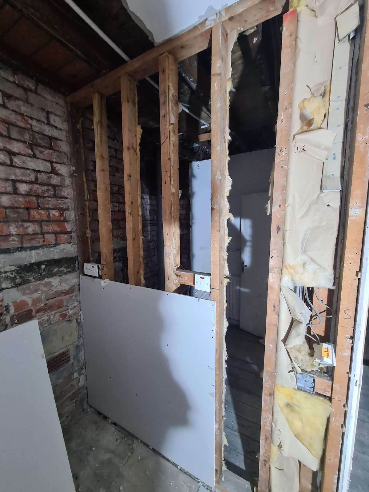 Stud work boarded out ready for skimming