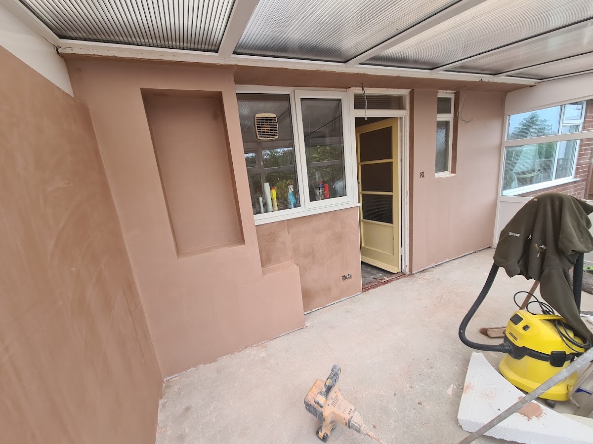 Conservatory being skimmed, vacuum on site